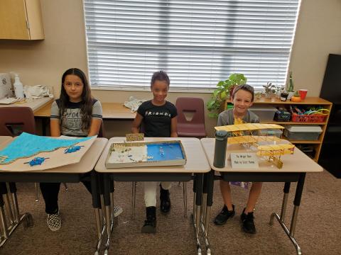 Three students with state fair projects