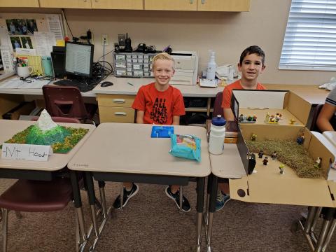 Two boys with their state fair projects