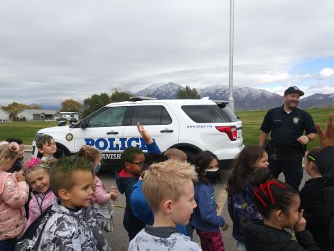 Rees students learning about the work of a police officer