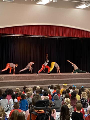 Dancers performing to Rees students 