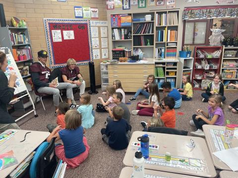 MMHS football players reading in Ms. Wilzbach's class