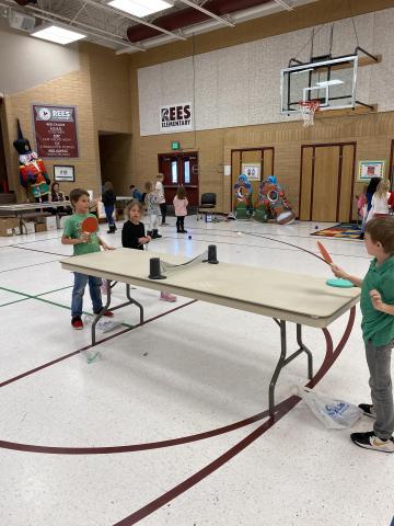 Students playing ping pong