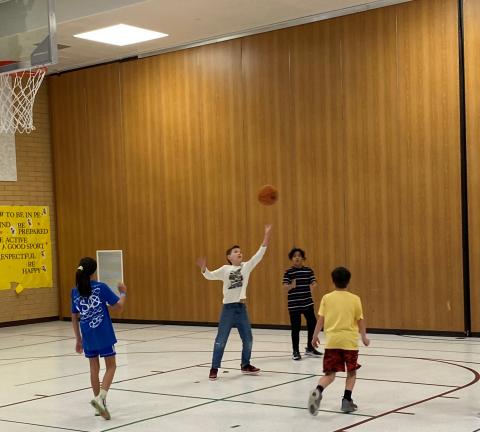 5th grade students playing basketball
