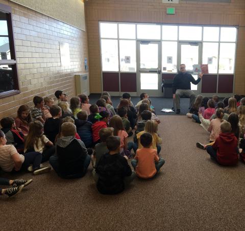 Mr. Gull reading to 2nd grade students