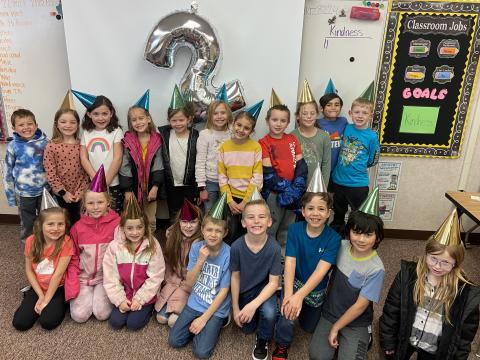 Mrs. Roberts' class in party hats on "twos' day