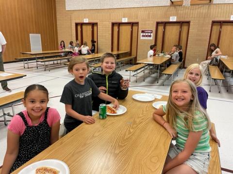 Rees third grade students having fun at the pizza party with