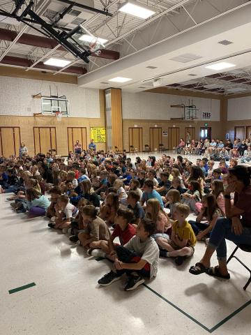 Rees third and fourth grade students listening to ways they can use the internet safely and positively 