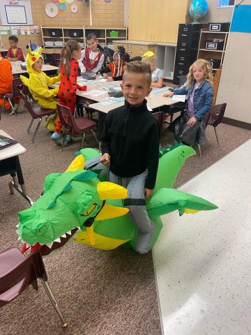 First Grade boy in Mrs. Coley's class with a blow up dragon costume