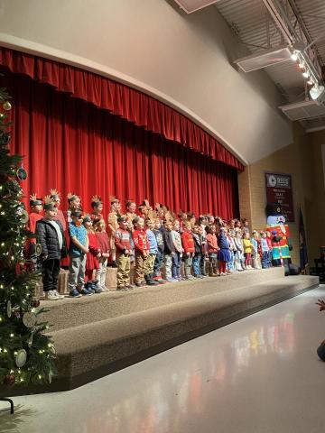 Rees Kindergarten students singing on stage for parents 