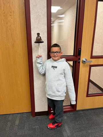 Danny Ringing the bell after passing off his letter names and sounds!