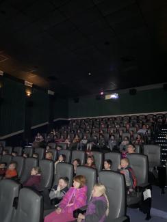 Rees 2nd and 1st Grade Students enjoying the movie