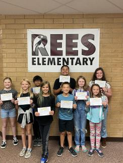 5th grade students holding their keyboarding certificates. 