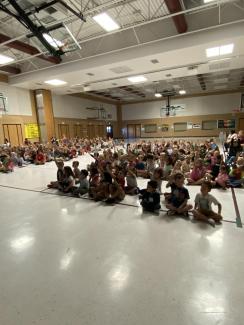 Rees students learning about the five rules of internet safely during a Net Positive assembly 